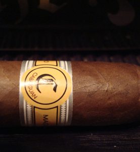 Single Cabaiguan cigar with smooth, light brown Ecuadorian Connecticut wrapper and elegant band.