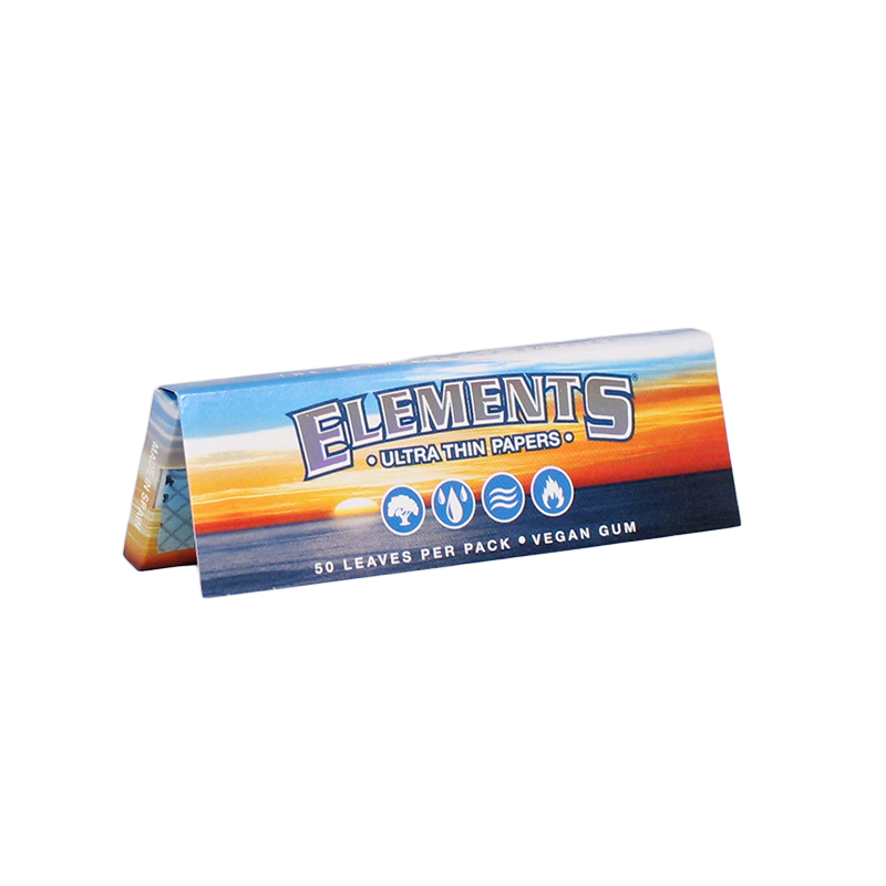 Elements 1 1/4 Rolling Paper pack standing upright with a few sheets pulled out