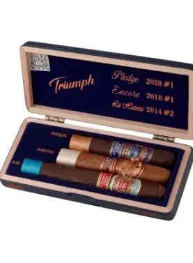 E.P. Carrillo Trilogy Triumph Sampler featuring three premium cigars from La Historia, E.P. Carrillo Core, and Pledge blends, each with distinct wrappers and bands, showcasing the variety and craftsmanship of E.P. Carrillo cigars