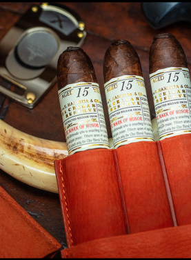 Three Gurkha Cellar Reserve 15 Year cigars in a leather travel case