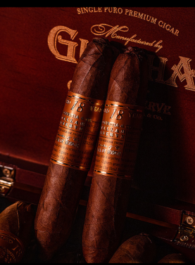 Two Gurkha Cellar Reserve Edición Especial 18 Year cigars resting on closed box