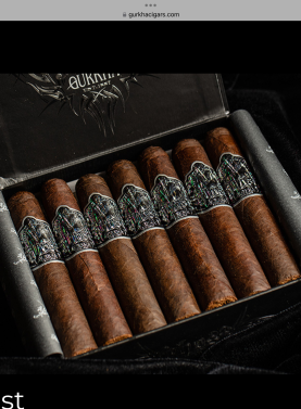 Open box of Gurkha Ghost cigars with dark wrappers