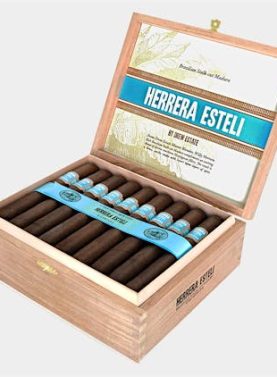 Open box of Herrera Estelí Brazilian Maduro cigars showcasing dark, rich wrappers.