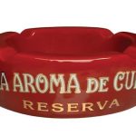 La aroma de Cuba branded cigar Ashtray in red ceramic with white logo and deep grooves