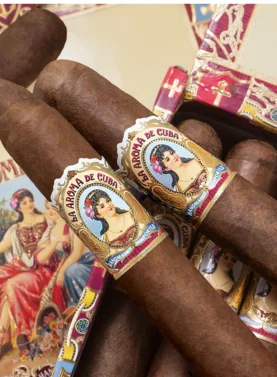 Box of La Aroma de Cuba Original cigars arranged neatly with vintage-style bands and rich brown wrappers.