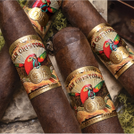 Four San Cristobal Original cigars with dark, rich wrappers and elegant bands arranged in a decorative display, showcasing their premium craftsmanship and refined appeal.