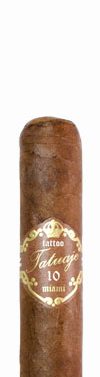 Single Tatuaje 10th Anniversary cigar with a dark, oily wrapper and signature band, resting on a wooden surface.