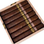 Open box of Tatuaje Cojonu 2018 cigars with rich, dark Ecuadorian Habano wrappers and bold, vintage-inspired branding.