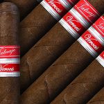 Open box of Tatuaje Havana VI Verocu Blue No. 2 cigars with dark, rich Ecuadorian Habano wrappers and sleek, bold branding.