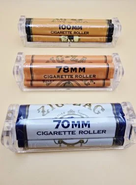 Three different sizes of Zig Zag Rolling Machines: Small, Medium, and King Size, with their corresponding packaging.