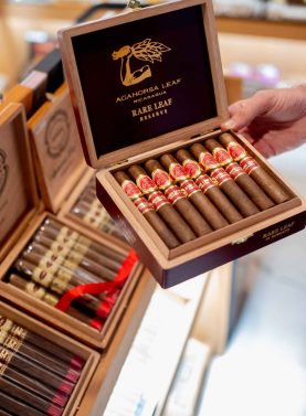 Open box of Aganorsa Leaf Rare Leaf cigars, displaying their rich, dark wrappers and flawless construction, offering a bold and complex smoking experience.