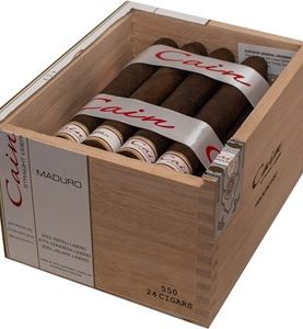 Open box of Cain Maduro cigars featuring dark, oily wrappers and bold branding