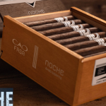 Open box of CAO Fuma Noche cigars featuring dark Brazilian Mata Fina wrappers and premium construction.