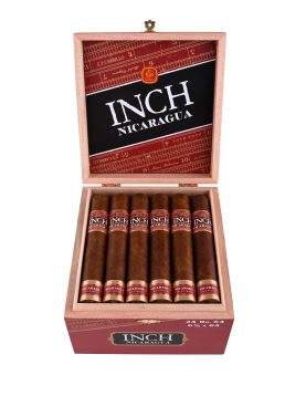 Open box of Inch Nicaragua cigars with dark Nicaraguan wrappers and bold black-and-gold bands neatly arranged in a wooden box.