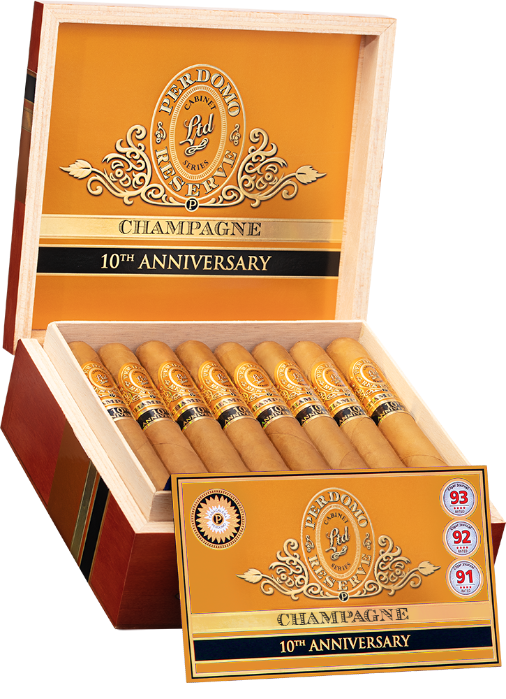An open box of Perdomo 10th Anniversary Champagne cigars, featuring the light, smooth wrappers and gold bands, elegantly arranged inside the box.