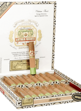 Open box of Arturo Fuente Château Fuente cigars with cedar sleeves and signature white bands, displayed in a classic wooden box.