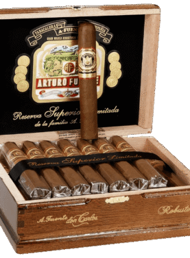 Open box of Arturo Fuente Don Carlos cigars with dark Cameroon wrappers and red-and-gold bands displayed in a cedar-lined presentation.