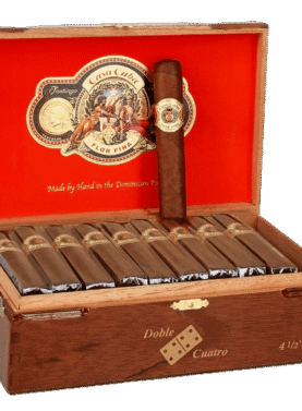 Open box of Casa Cuba by Arturo Fuente cigars with natural wrappers and the distinctive red and gold bands, displayed in a traditional wooden box