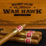 Five Henry Clay War Hawk cigars with closed box in background