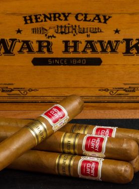 Five Henry Clay War Hawk cigars with closed box in background