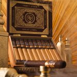 Open box of Rocky Patel Gold Label cigars, showcasing perfectly arranged cigars with elegant, gold-accented packaging.