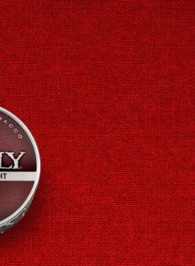 A can of Grizzly Long Cut Straight smokeless tobacco with its signature red label and bear logo.