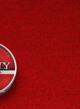 A can of Grizzly Natural Fine Cut smokeless tobacco featuring its tan-colored label and Grizzly bear logo.