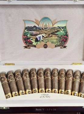 Oliva Serie V 135th Anniversary cigars displayed in an open, elegant box