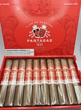 Open box of Partagás Cortado cigars with smooth, light-colored wrappers and gold-accented bands.