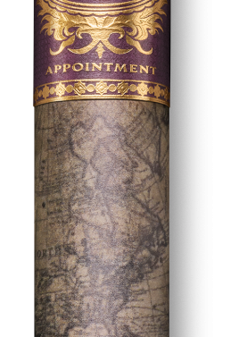 Single El Rey Del Mundo Apointment cigar with detailed band, placed on a dark wood surface.