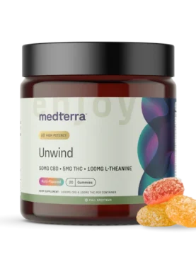 Jar of Medterra Unwind CBD Gummies with a few gummies beside it, highlighting texture and serving size.