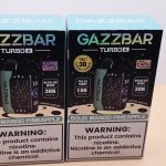 2 Pack Gazzbar Disposable Vape Sour Mango Pineapple flavor with 30,000 puffs, 28ml e-liquid, dual mesh coil, quick charge battery, and 3D curved screen