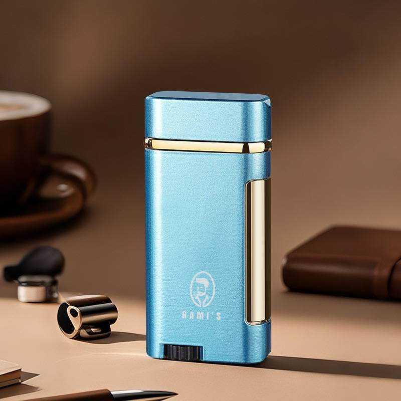 Blue Rami’s dual flame rechargeable lighter with premium metal finish and compact windproof design displayed on desk.