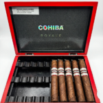 Open Red and black Cohiba Royale luxury cigar box showing five Robusto Cigars with holographic bands on a carbon fiber interior