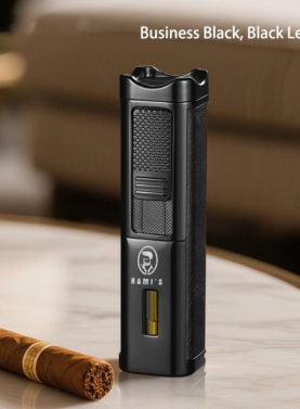 A tall, matte black Rami's Accessories executive lighter with textured black leather siding, featuring a fuel window and the brand logo, standing on a marble table next to a cigar.